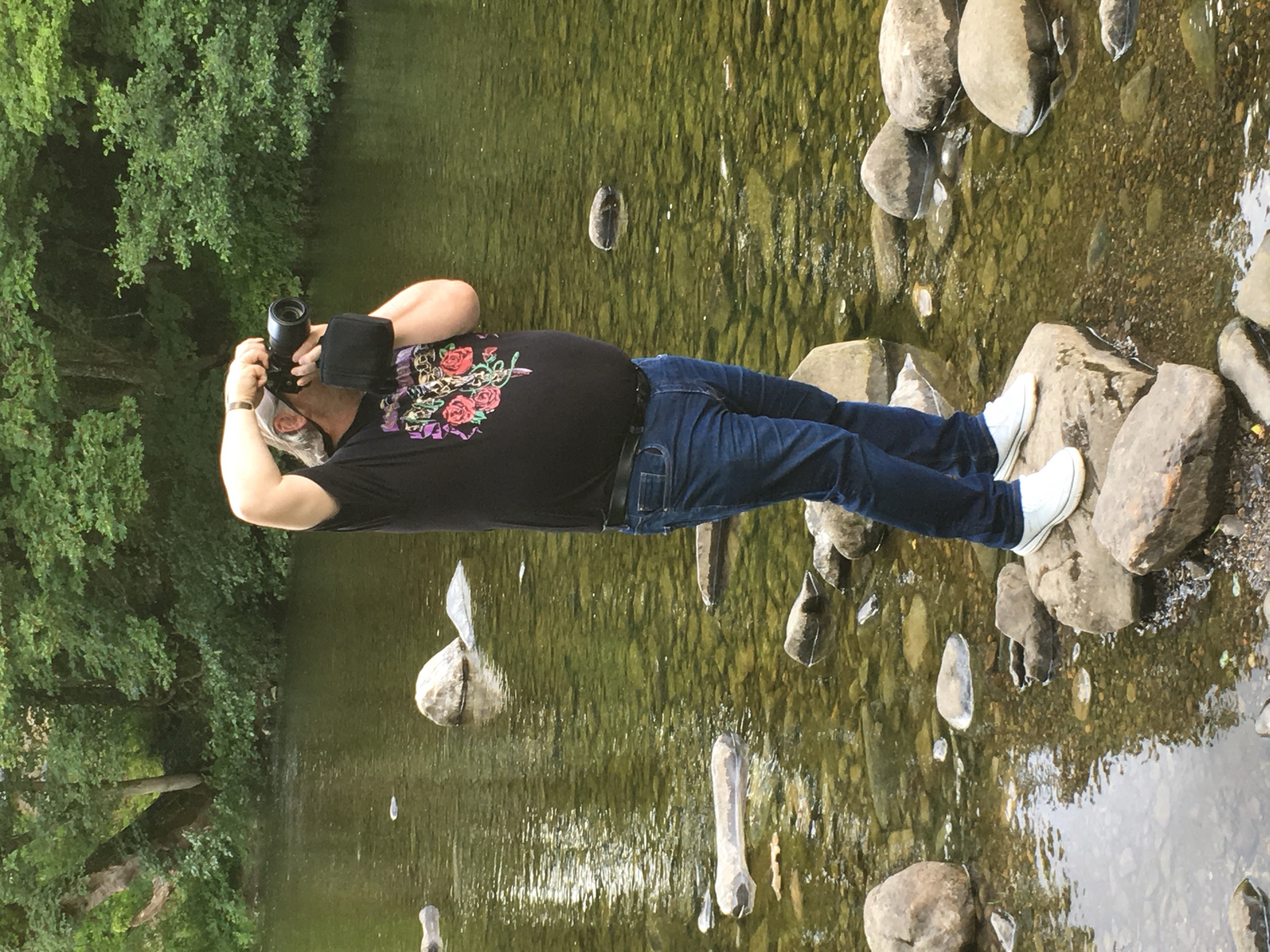Barry Henderson photographing outdoors