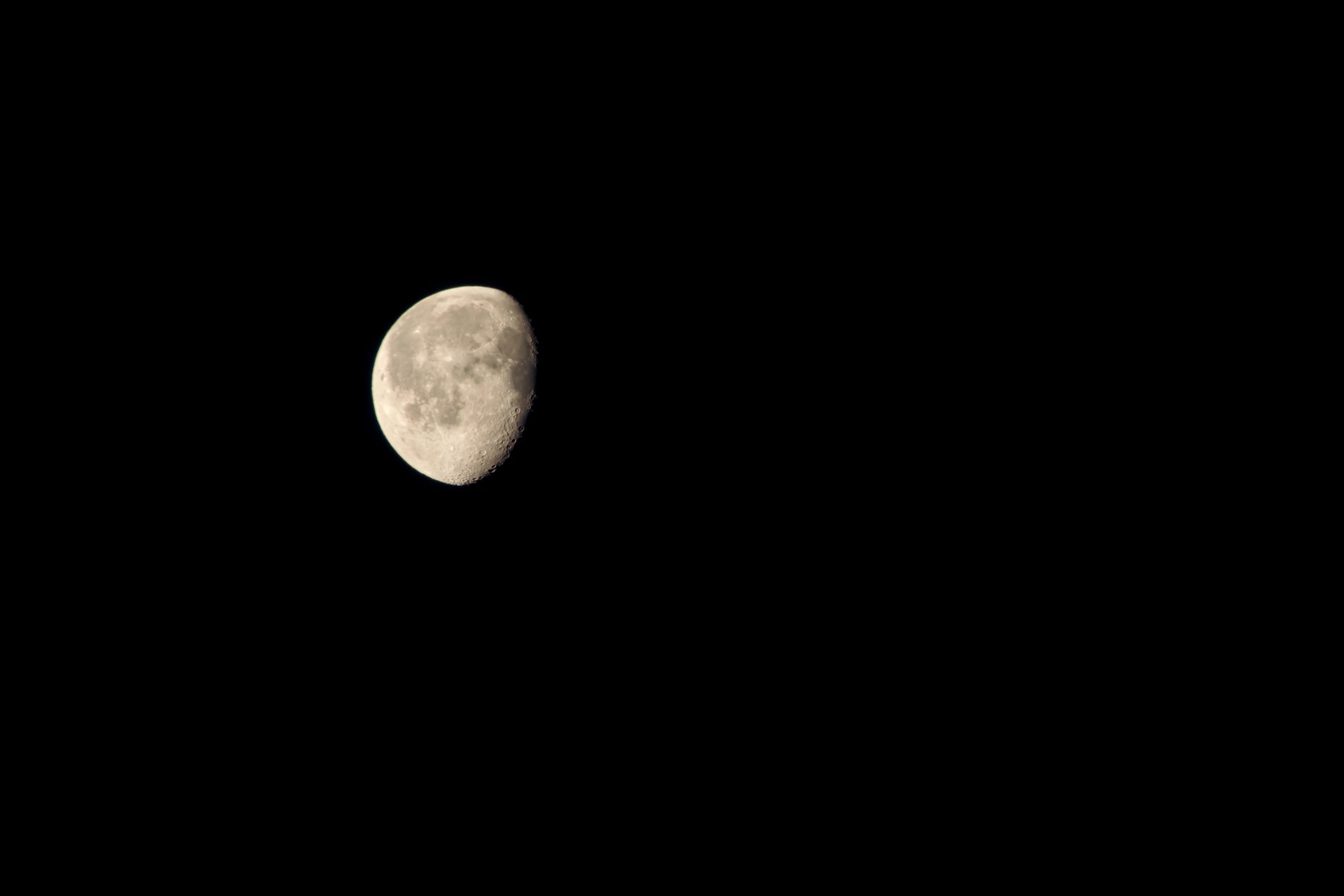 Moon against a dark night sky photograph available as a professional print
